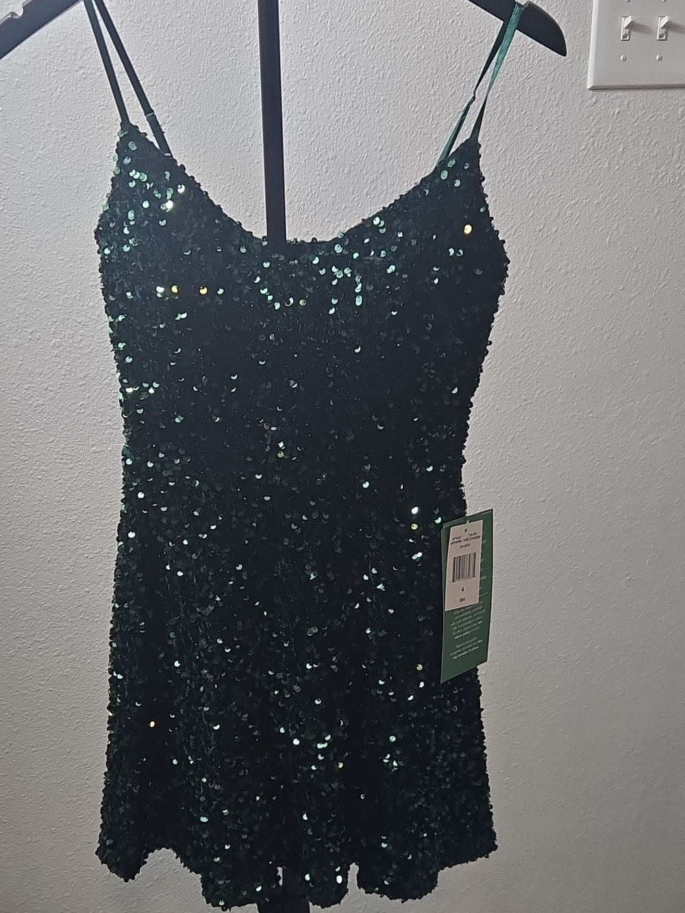 B. Smart Emerald Green Dress with Tag Detail